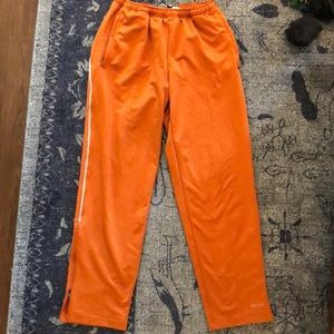 Men’s burnt orange Nike sweatpants, size L!